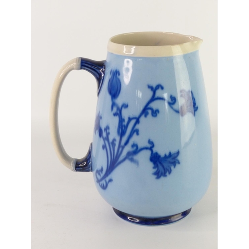 31 - A vintage Paramount Pottery jug with bird handle and another blue patterned jug (a/f).