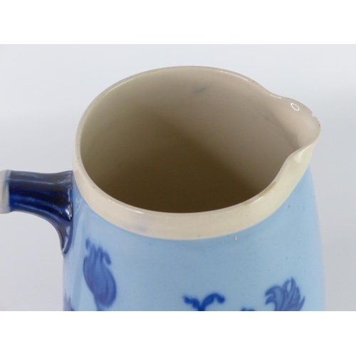 31 - A vintage Paramount Pottery jug with bird handle and another blue patterned jug (a/f).