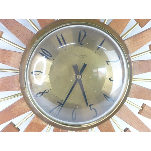 37 - A stunning vintage/ Mid Century sunburst wall clock by Anstey & Wilson - England. (a/f), 64cm.
