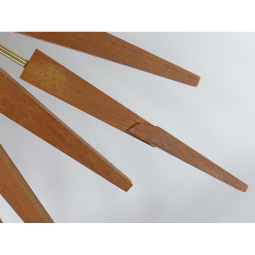 37 - A stunning vintage/ Mid Century sunburst wall clock by Anstey & Wilson - England. (a/f), 64cm.