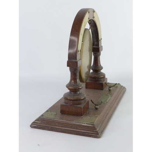 51 - A vintage brass gong on stand.