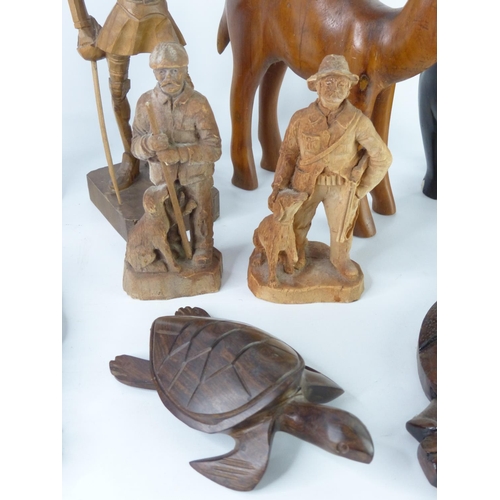 57 - A pair of African style wooden wall plaques, a Spanish military wooden figure and lots more.