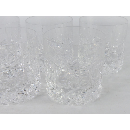 61 - A set of five crystal glasses.