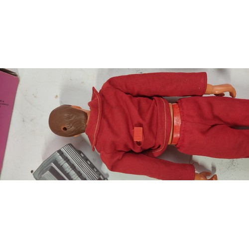 123 - A vintage boxed Nasa Tours Kennedy Space Centre Florida toy figure and an original boxed Six Million... 