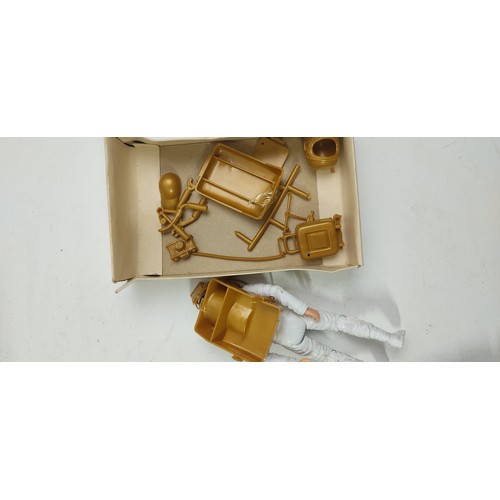 123 - A vintage boxed Nasa Tours Kennedy Space Centre Florida toy figure and an original boxed Six Million... 