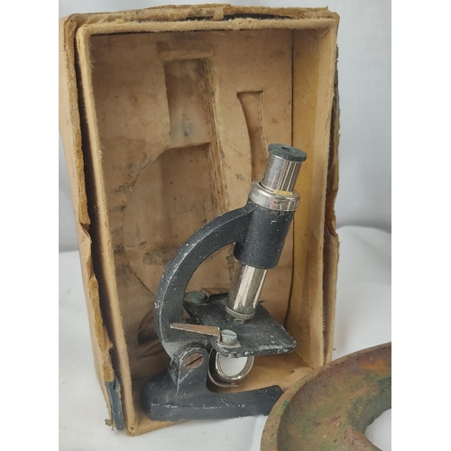 A vintage military box and cap, three cast metal letters 'SPY', and a ...