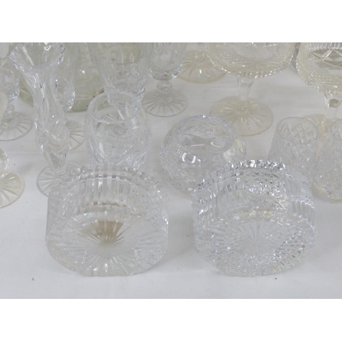 17 - A large assortment of crystal to include a set of three Tyrone crystal vases, a ships decanter, a Ty... 