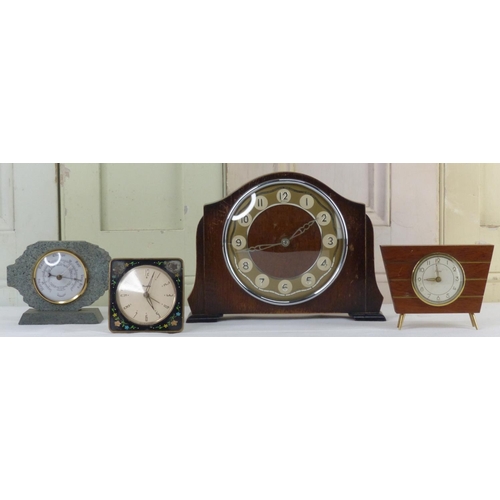 3 - A vintage Westclox floral enamel alarm clock and three others.