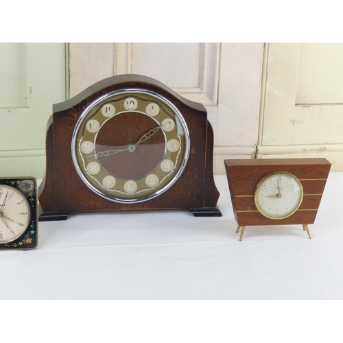 3 - A vintage Westclox floral enamel alarm clock and three others.
