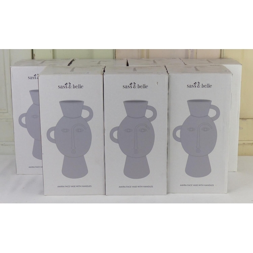 32 - Seven boxed Sass & Belle Amira Face vase with handles.
