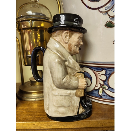 16 - A Royal Doulton 'Winston Churchill' character jug. Measuring approx 21cm