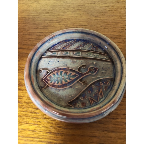 30 - A pair of studio pottery plaques, by Diane McCormick. Measuring approx 12cm in diameter