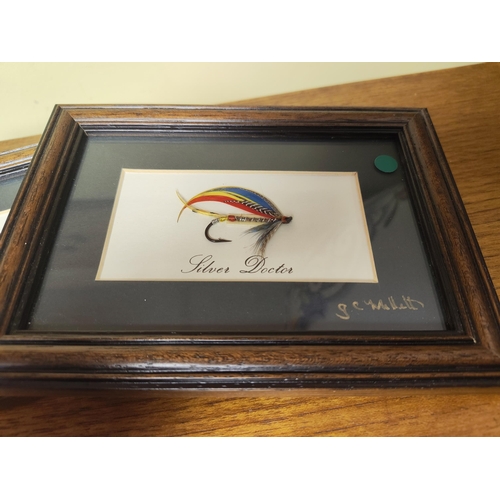 32 - A pair of framed fly fishing flies. Measuring approx 18cm x 13cm.