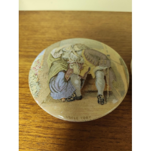 38 - A pair of decorative pot lids/ plaques.