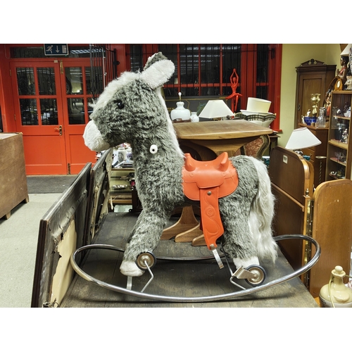 A vintage/ retro rocking donkey.