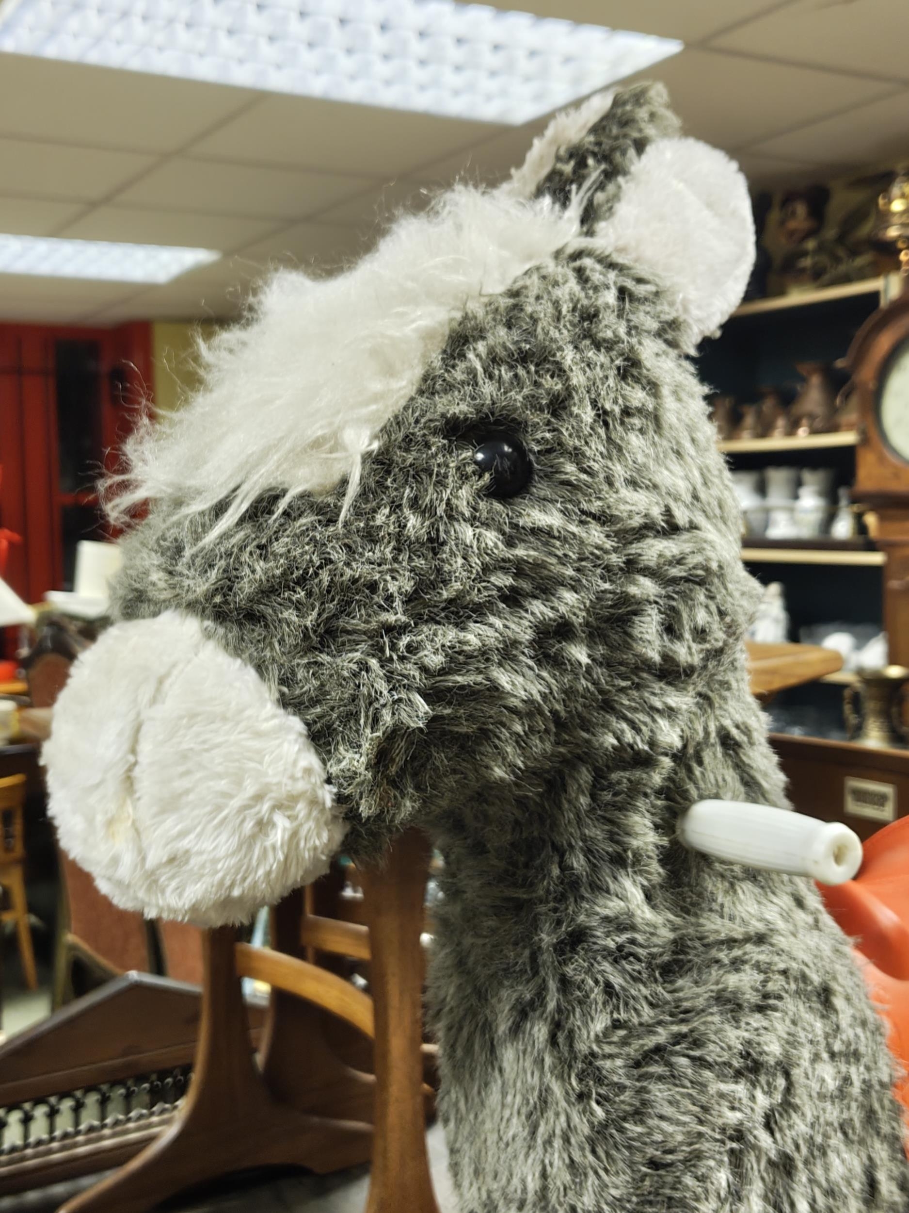 A vintage/ retro rocking donkey.