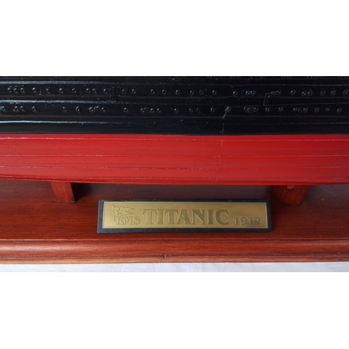 1 - Model of the RMS Titanic (1912), detailed with four funnels, deck fittings, lifeboats and rigging, f... 