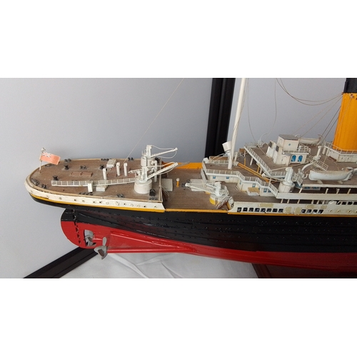 1 - Model of the RMS Titanic (1912), detailed with four funnels, deck fittings, lifeboats and rigging, f... 