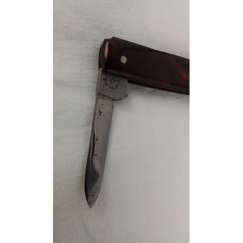 27 - A William Rodgers, Sheffield two-blade folding pocket knife with tortoiseshell-effect scales, vacant... 