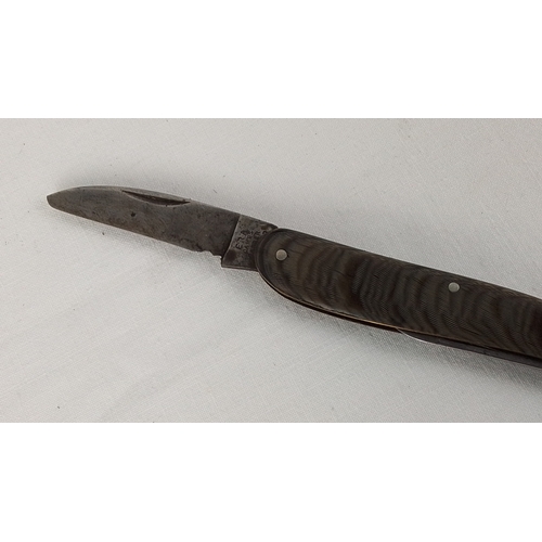 28 - A vintage James Barber folding pocket knife with two steel blades and moulded dark marbled handle sc... 