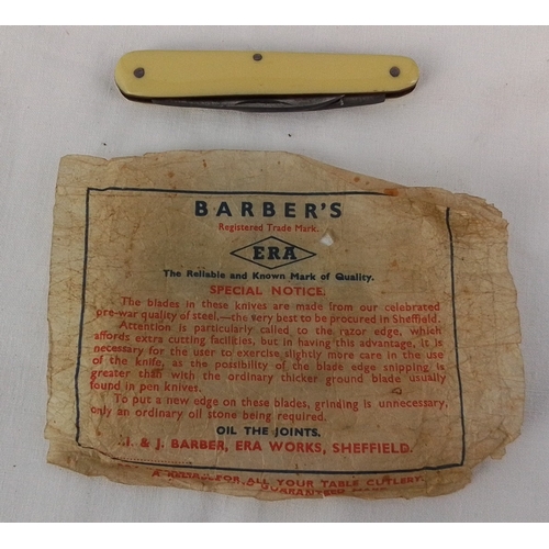 30 - A pocket knife James Barber, Sheffield, with two folding steel blades and cream-coloured handles, ac... 