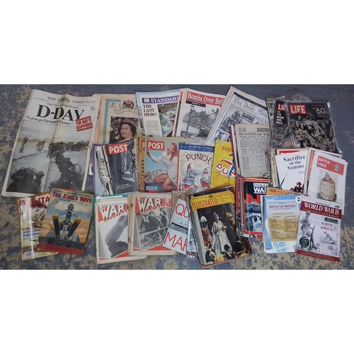 121 - A large collection of 20th-century newspapers and magazines, largely military and wartime themed, in... 