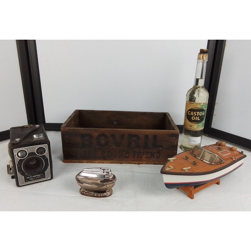 150 - A vintage Kodak Six-20 Brownie E box camera, Bovril branded wooden crate, an unopened vintage castor... 