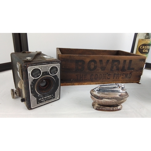 150 - A vintage Kodak Six-20 Brownie E box camera, Bovril branded wooden crate, an unopened vintage castor... 