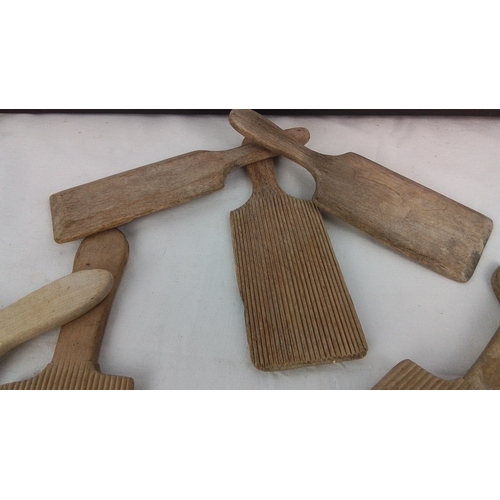 151 - Collection of 7 antique wooden butter pats.