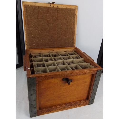 152 - An early 20th century EGGS merchant’s wooden transit crate, with iron corner straps and hasp fastene... 