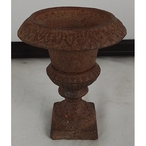 175 - An early salesman cast iron urn-form planter/vase on integral pedestal base, with lobed rim and squa... 
