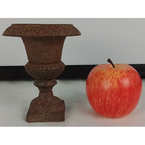 175 - An early salesman cast iron urn-form planter/vase on integral pedestal base, with lobed rim and squa... 