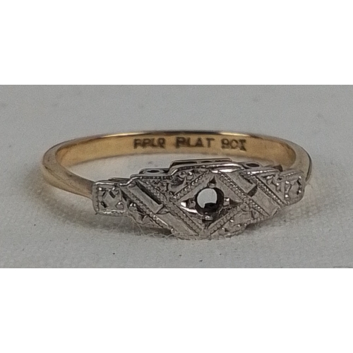 183 - A vintage platinum-fronted 9ct gold dress ring, the geometric head with engraved decoration and a ce... 