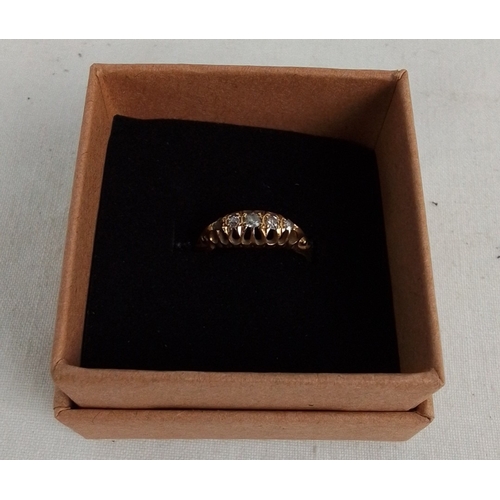 184 - A 18ct gold five-stone diamond ring, the graduated round brilliant stones in pierced gallery setting... 