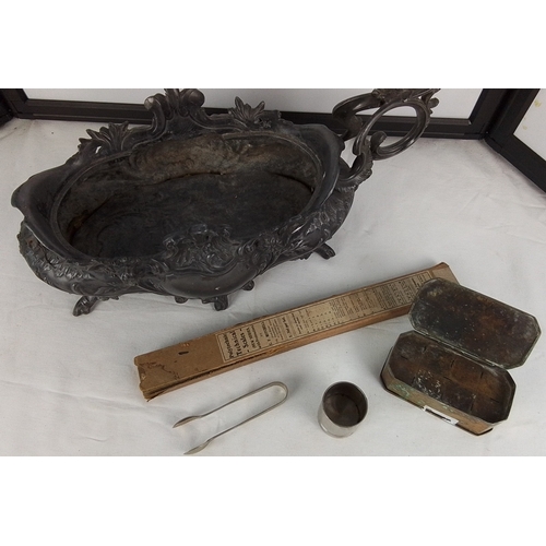 197 - Comprising an ornate pewter two-handled jardinière or centrepiece bowl on scroll feet, a set of sug... 