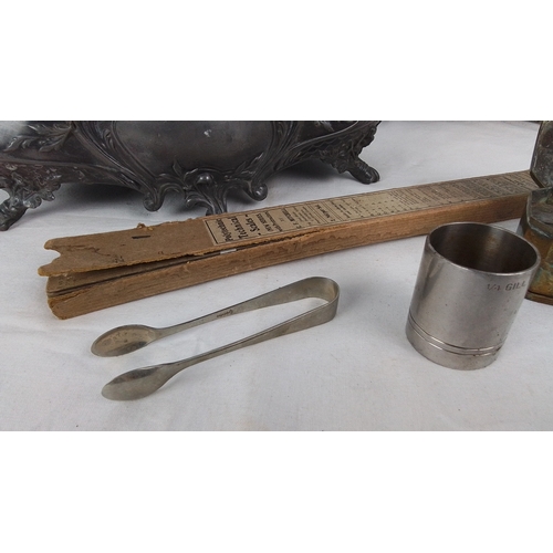 197 - Comprising an ornate pewter two-handled jardinière or centrepiece bowl on scroll feet, a set of sug... 