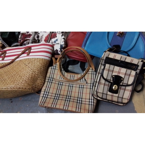 306 - Group of assorted handbags and purses, including woven straw tote, tartan-pattern handbags, floral-p... 