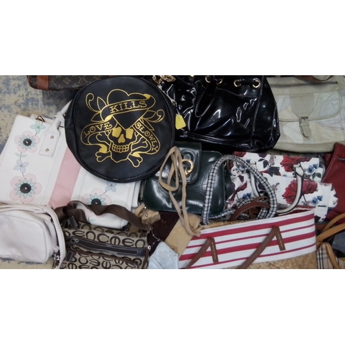 306 - Group of assorted handbags and purses, including woven straw tote, tartan-pattern handbags, floral-p... 