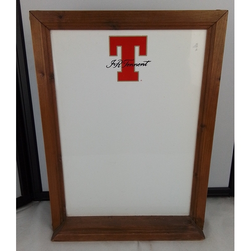 307 - A framed advertising white board for J.R. Tennett, bearing a large red letter 