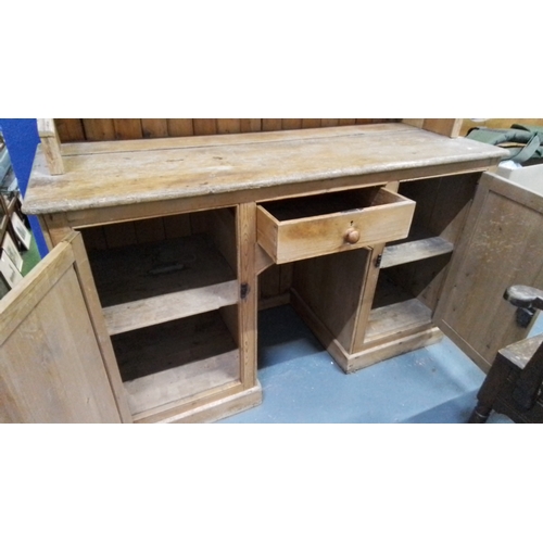 322 - A stunning large antique pine dresser, open plate rack superstructure, having moulded cornice, five ... 