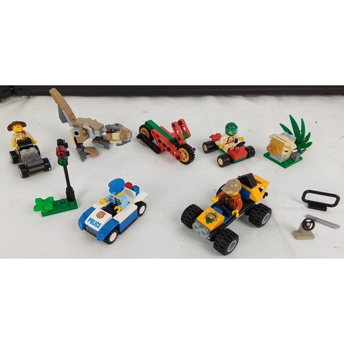 361 - Collection of LEGO mini models including a police car with officer, two small buggies with minifigur... 