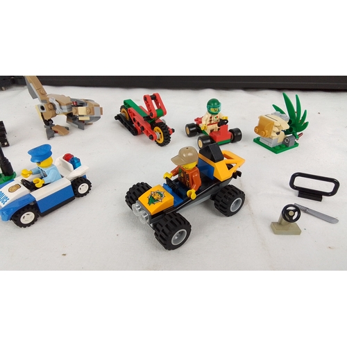 361 - Collection of LEGO mini models including a police car with officer, two small buggies with minifigur... 