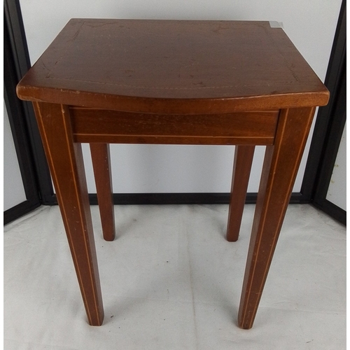 393 - A small rectangular occasional table, the top with a shaped front edge and line-inlaid border, raise... 