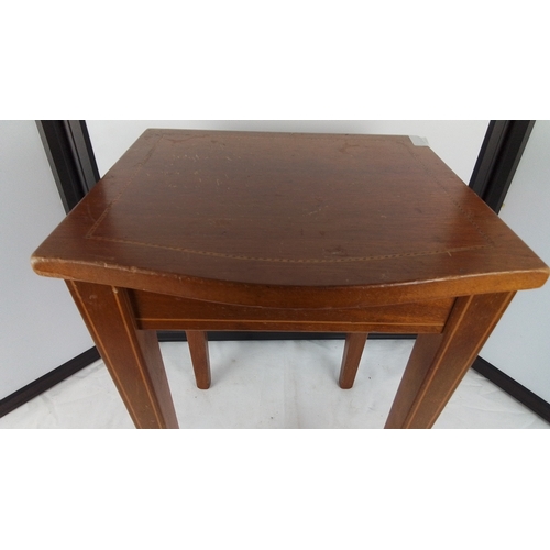 393 - A small rectangular occasional table, the top with a shaped front edge and line-inlaid border, raise... 
