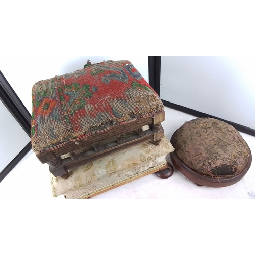 404 - Collection of upholstered footstools comprising a rectangular wooden stool with turned legs and stre... 