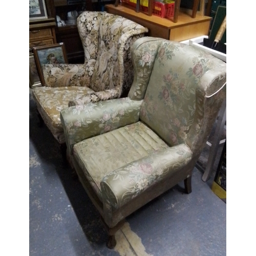 405 - Pair of upholstered wingback armchairs, one in green floral fabric with scroll arms, the other in ta... 