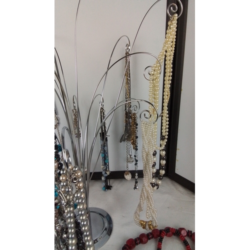 429 - Collection of costume jewellery, including faux pearl and metallic bead necklaces, assorted pendants... 