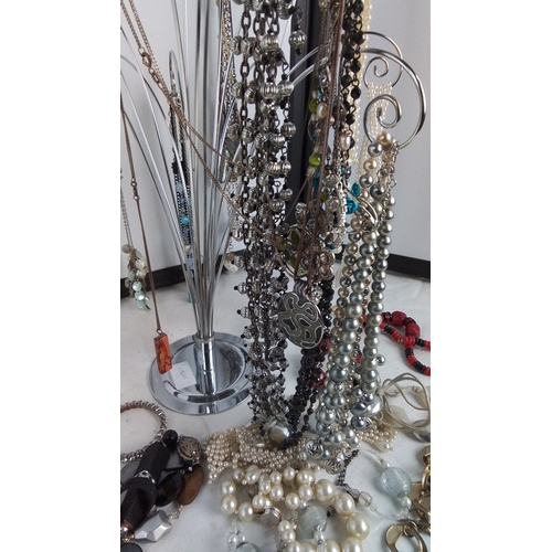 429 - Collection of costume jewellery, including faux pearl and metallic bead necklaces, assorted pendants... 