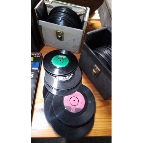 433 - Collection of vinyl records, including LPs and 45rpm singles, housed in three carry cases; visible t... 