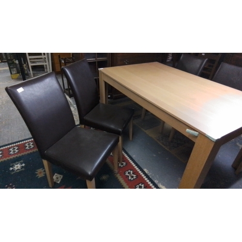 445 - Set of 4 contemporary dining chairs, with black upholstered seats and backs and light-toned legs, to... 